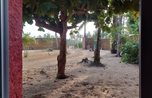 Comoe House | Red Villa