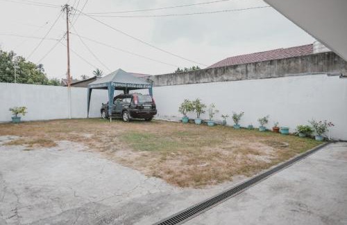 Jambi House | RedDoorz @ Beringin Jambi