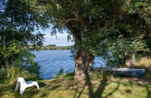 Breiholz House | Reetdachhaus Eiderblick