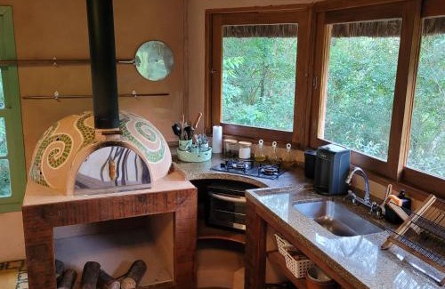 Mairipora House | Refúgio Terracota uma casa bioconstruída com arte