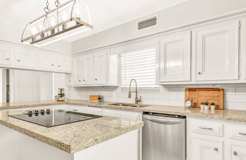 Seven Coves House | Relax and unwind on the deck with water view of Lake Conroe