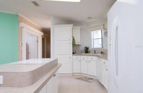 Charlotte Park House | Relax at 710 El Dorado Dr, canal waterfront property with private dock