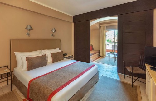 Makadi Bay Resort | Relax in a Calm Room with Outdoor Pool Near Makadi Water World Aqua Park