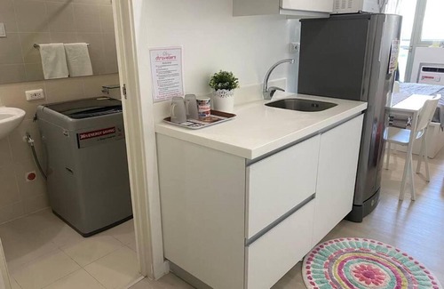 San Fernando Apartment | Relax in Comfort at Dtravellers Home at Azure North