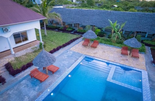 Nungwi House | "Relaxing cozy bungalows Escape with Garden Views & Free WI-FI with speed