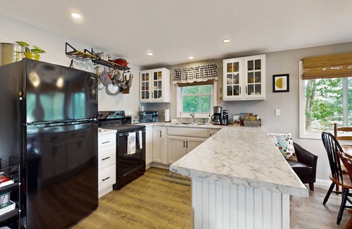 Castleton House | Relaxing, cozy, lakefront home with secluded deck, dock & direct lake access