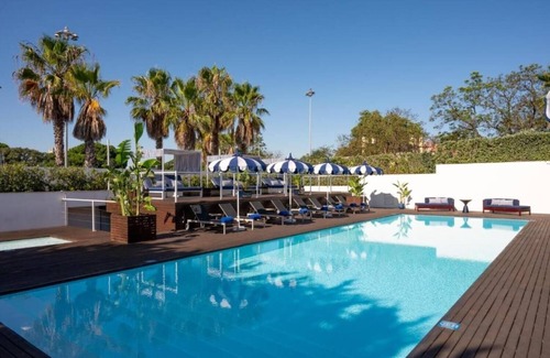 Belem Hotel | Relaxing Lisbon Retreat with Outdoor Pool & Garden Views | Free Parking Included