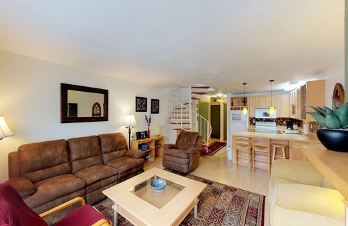 Alyeska Condo | Renovated condo with mountain views, fireplace & spiral staircase - walk to lift