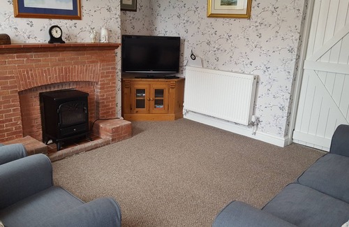 Sigglesthorne Cottage | Renovated cottage in village location with spectacular countryside views