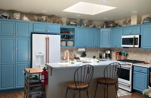 Newport Condo | Renovated Waterfront home with gorgeous views of the Bay, Bridge and South Jetty