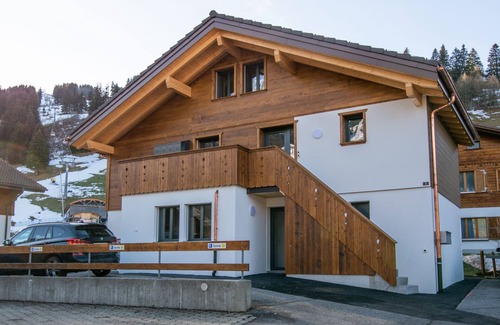 Adelboden Apartment | right on the ski hill, a cozy 2 bedroom with living room apartment fits 6 people