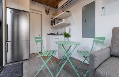 Rileyville Apartment | Riverside Tiny Cabin w Hot Tub, Fire Pit, & Kayaks