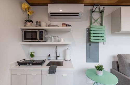 Rileyville Apartment | Riverside Tiny Cabin w Hot Tub, Fire Pit, & Kayaks