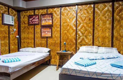 Hinatuan Hotel | Rock Island Resort