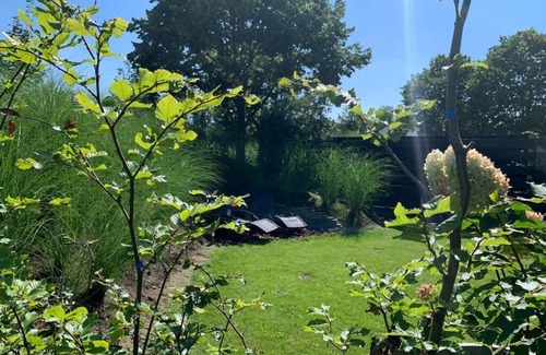 Wilbertoord Apartment | Romantic luxury apartment great garden with fire table 5 minutes to the forest.