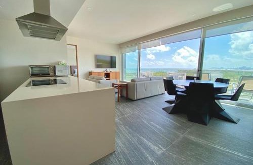 Zona Hotelera Apartment | Rooftop pool- family apartment- ocean view -close