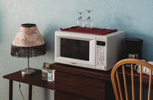 Sointula House | Room 208- Oceanfront room with balcony & two queen sized beds.