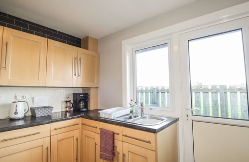 Lybster Cottage | ROSE COTTAGE, family friendly, with a garden in Lybster