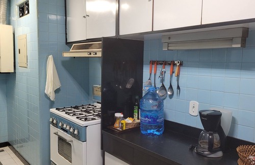 Leme Apartment | Rudder standing in the sand