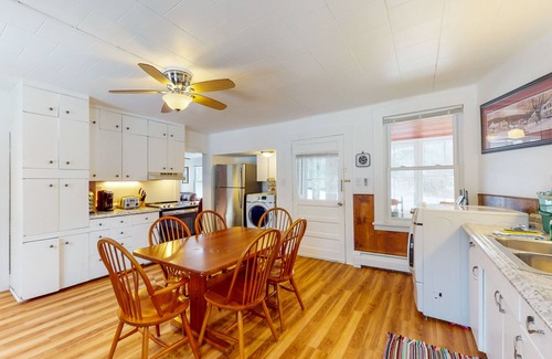 Rochester House | Rural mountain-view home near skiing with screened porch, firepit, & game room