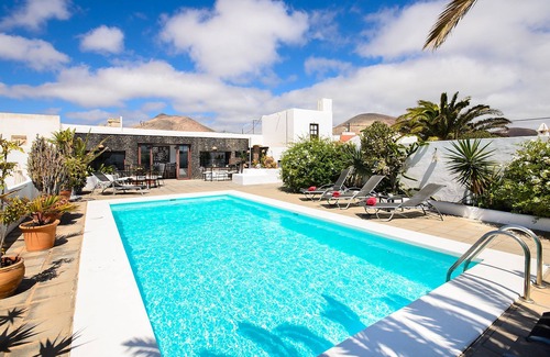 Guime House | Rustic Home Short Drive from Beach with Pool, Terraces & Garden