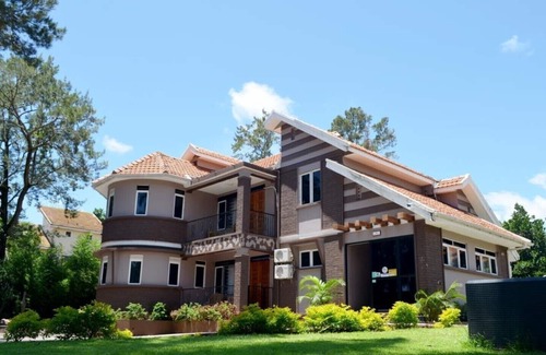 Entebbe Hotel | Saffron Beach Bistro & Cottages - Honeymoon Suite 1