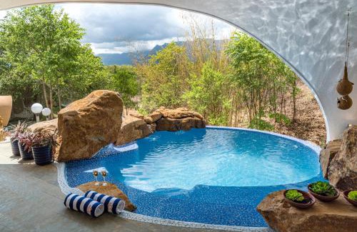 Murbad Villa | SaffronStays AsanjA Titaly, Murbad - hobbit inspired earth-shelter home with plunge pool