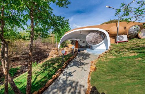 Murbad Villa | SaffronStays AsanjA Titaly, Murbad - hobbit inspired earth-shelter home with plunge pool