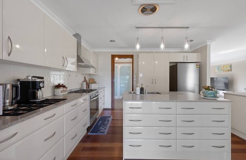 San Remo House | San Remo Charm with Waterfront Views & Sunroom