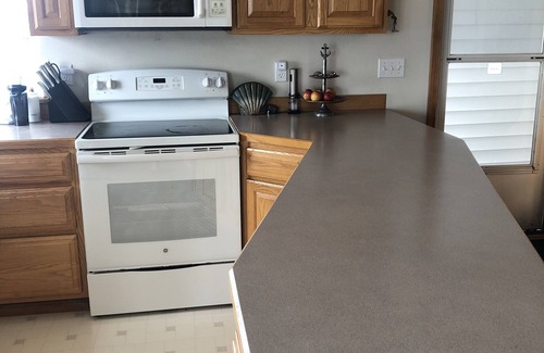 Lakebay Cottage | Sandy Beach Front Cottage with great Sunsets