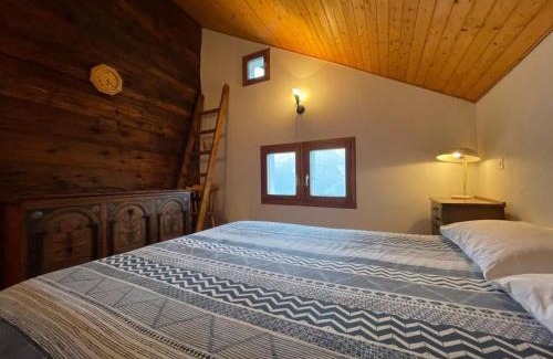 Anzonico Apartment | Santorini by Quokka 360 - Blue curtains in the Alps