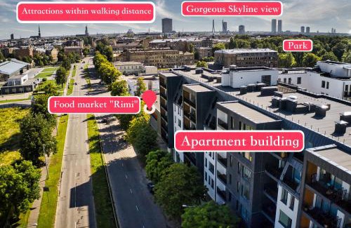 Andrejsala Apartment | Scan QR code for apartment video tour - free parking, gym access, air conditioning, kitchen and more in central Riga