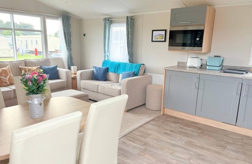 Newcastle House | Scenic mountain views from “Serenity”, a luxury 6-bed caravan in Newcastle, NI