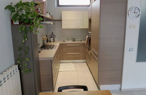 Ghisolfa House | Semi detached loft in quiet courtyard, with private patio.