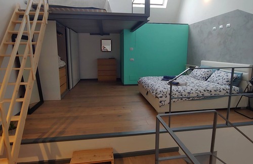 Ghisolfa House | Semi detached loft in quiet courtyard, with private patio.