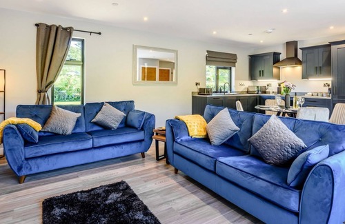 Tirabad Cottage | Set in a rural location, this pair of lodges offer spacious and comfortable accommodation, complete