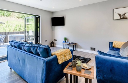 Tirabad Cottage | Set in a rural location, this pair of lodges offer spacious and comfortable accommodation, complete