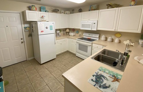 Crescent Beach Condo | Spacious 2 Bedroom/2 bathroom Condo with Ocean View, Pool, Elevator, and Balcony