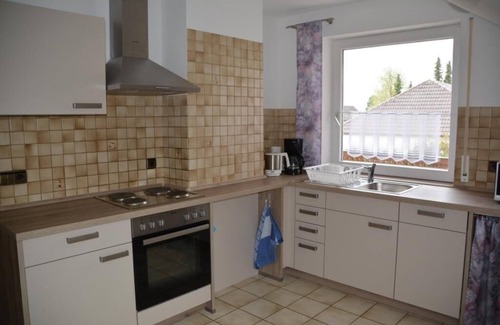 Deiningen Apartment | Spacious 3-star apartment with a large balcony and garden view