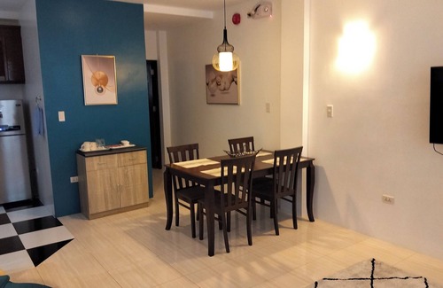 Tawala Apartment | Spacious apartment with separate toilet, sofa bed in living room.