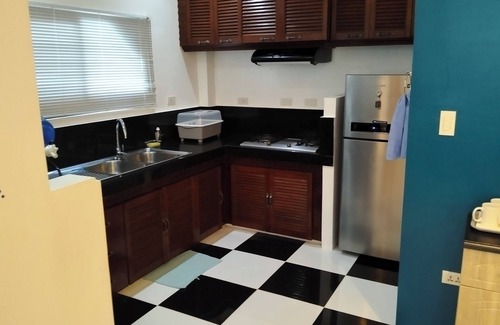 Tawala Apartment | Spacious apartment with separate toilet, sofa bed in living room.