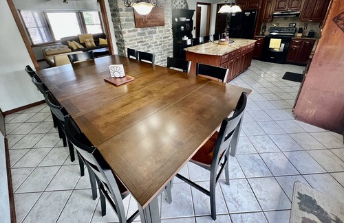 Keene House | Spacious family Lodge with solar heated pool, hot tub, fire pit and EV charger.