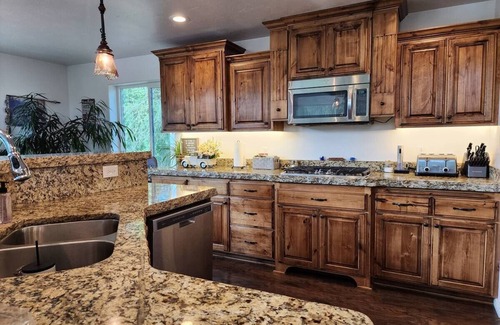 Ririe House | Spacious Riverside Four Bedroom Retreat