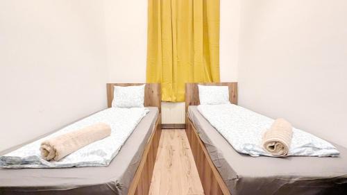 Erdberg House | Spacious Rooms - 15 Min from Airport & City Center, 5 Min from Vienna Main-Bus Station EZ1