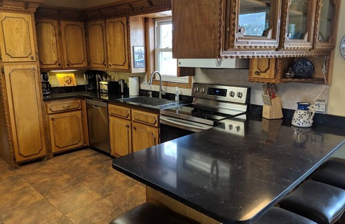 Howard House | Spanish Ranch on the Arkansas River- enjoy the rushing river from the Hot tub!