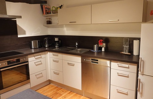 Lauda Apartment | Spend the night in the historic ambience of the Badhaus