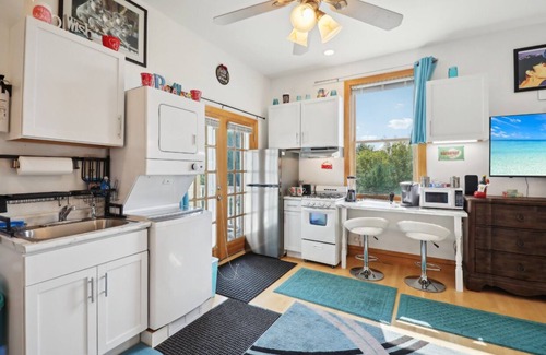 Fort Atkinson Villa | Starlight Tower Hot Tub King Suite with 8-Jet Massage Shower by RedAwning