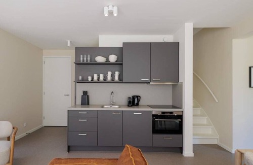 Oude-Tonge House | Stay in comfort in this modern, recently built holiday home with a beautiful view of the water from