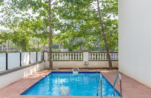 St.Stanislaus Villa Villa | StayVista at Greenwoods Villa 8 with Private Pool, Terrace, Lift & Ping-Pong Table