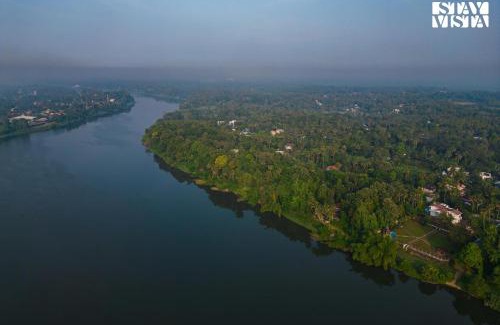 Alwaye Hotel | StayVista at Periyar Palace- Pet Friendly, River View Villa with Garden